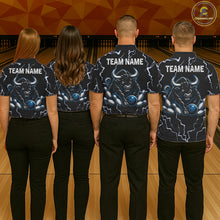 Load image into Gallery viewer, Back view of bowling team wearing matching blue bull bowling shirts in a bowling alley.