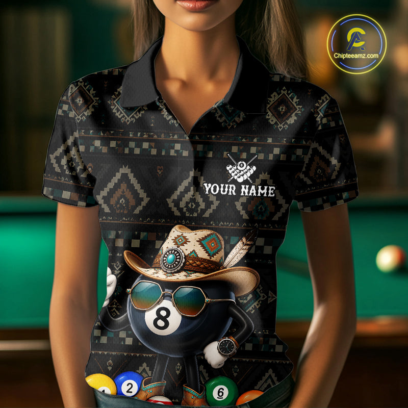 Woman wearing an 8 ball tribal pattern billiard jersey beside a pool table front view.