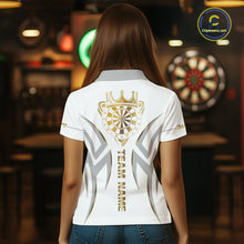 Load image into Gallery viewer, Back view of woman wearing a white and gold dartboard crown darts shirt.