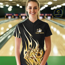 Load image into Gallery viewer, Woman wearing a black and gold bowling ball crown quarter zip bowling shirt front view.
