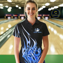 Load image into Gallery viewer, Woman wearing a black and blue bowling ball crown bowling polo shirt front view.