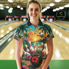 Load image into Gallery viewer, Woman wearing a tropical hibiscus ocean scene bowling polo shirt in a bowling alley, featuring customizable player name and team name text.