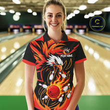 Load image into Gallery viewer, Woman wearing black and orange flame eagle bowling polo shirt front view.