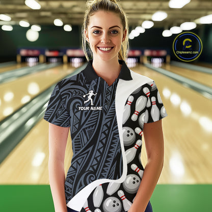 Woman wearing a blue tribal pattern bowling polo shirt at a bowling alley front view.