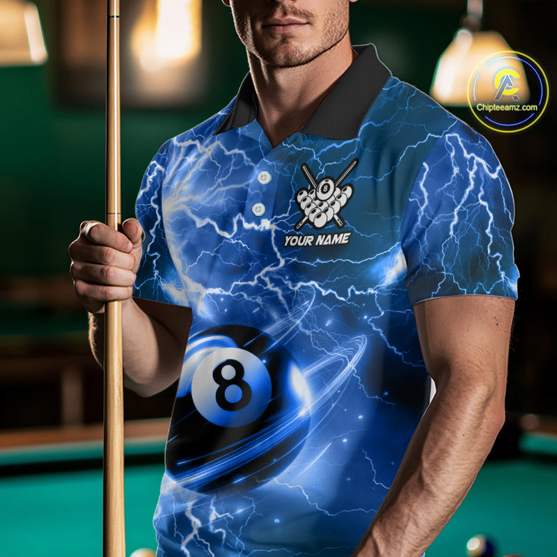 Man wearing a blue 8 ball thunder lightning billiard jersey beside a pool table front view.
