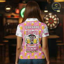 Load image into Gallery viewer, Back view of woman wearing a pink and white darts and beer darts shirt.