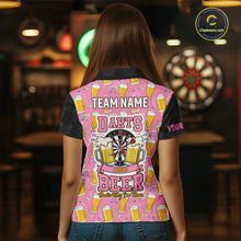 Load image into Gallery viewer, Back view of woman wearing a pink and black darts and beer darts shirt.