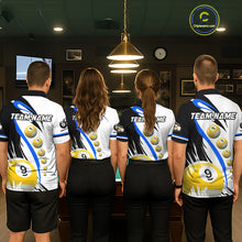 Load image into Gallery viewer, Back view of pool team wearing matching blue 8 ball and 9 ball billiard shirts.