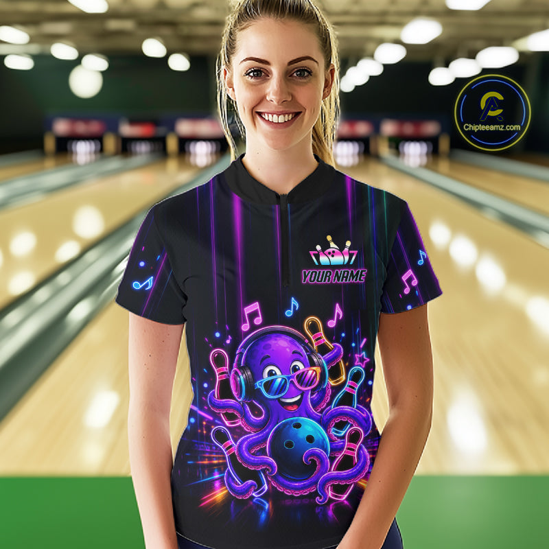 Woman wearing a neon octopus music bowling quarter zip jersey during tournament play front view.