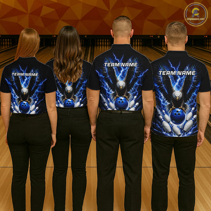 Back view of bowling team wearing matching blue eagle bowling shirts in a bowling alley.
