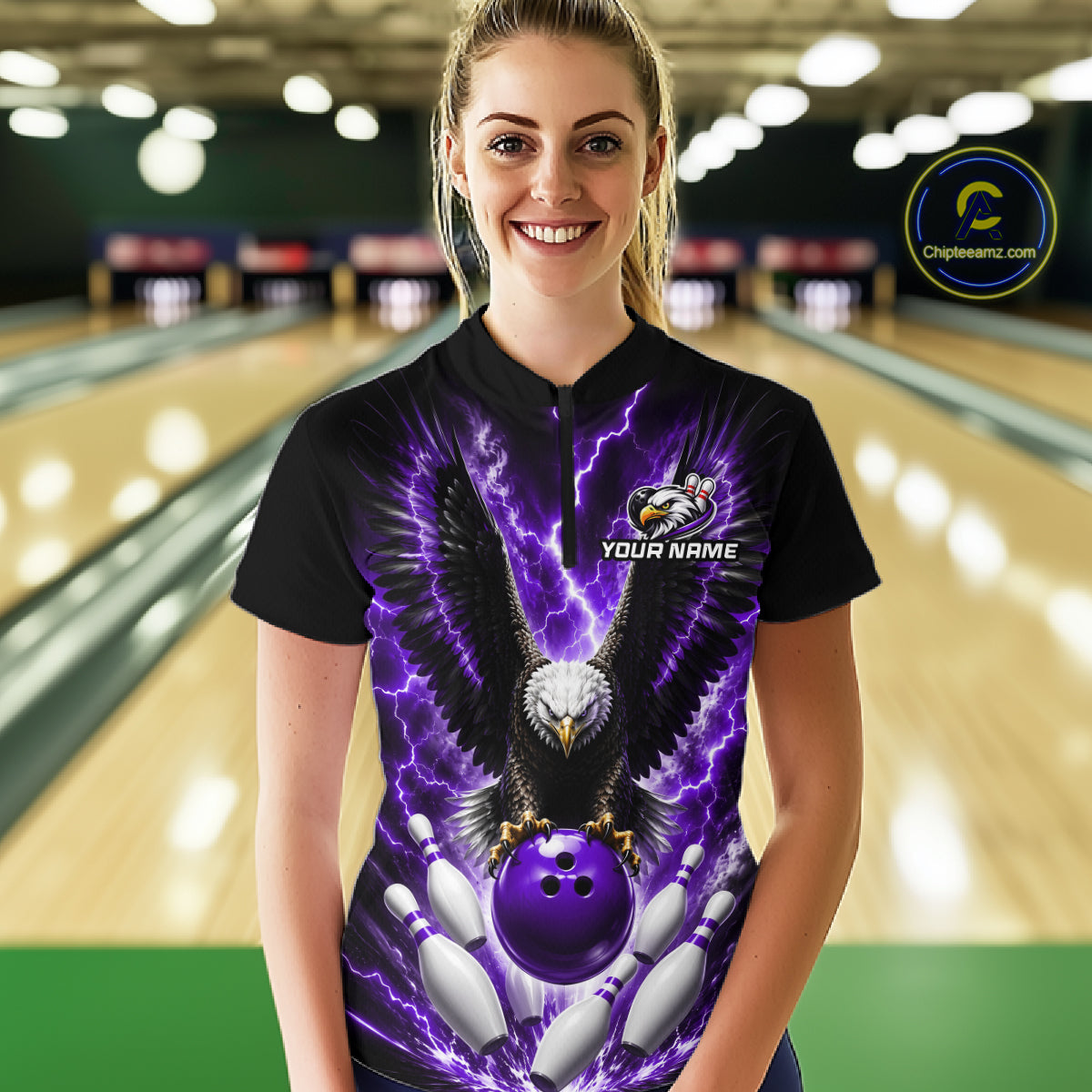 Woman wearing a purple thunder lightning eagle bowling quarter zip jersey during tournament play front view.