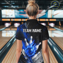 Load image into Gallery viewer, Woman wearing black and blue flaming bowling quarter zip shirt front view.