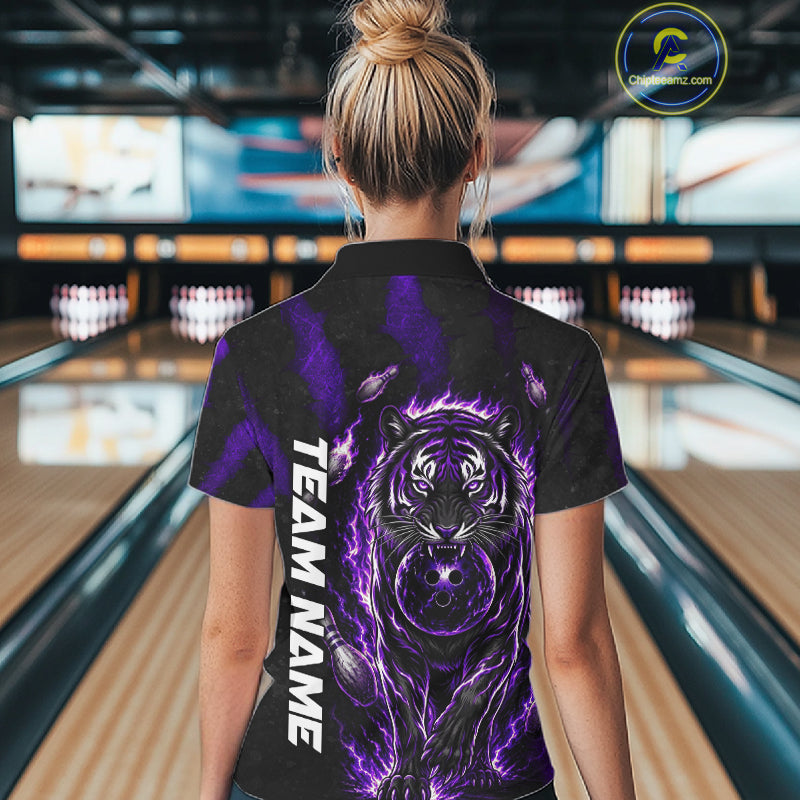 Female bowler wearing Fire Flame Tiger Purple Claws bowling shirt during tournament bowling competition