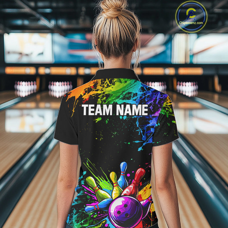 Female bowler wearing Colorful Rainbow Splatter bowling jersey, custom women's bowling shirt