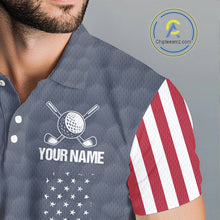 Load image into Gallery viewer, Male golfer wearing personalized American flag golf polo with grey golf ball design during tournament, ideal for patriotic golfers, veterans, golf clubs, Father's Day gifts and USA team spirit.
