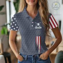 Load image into Gallery viewer, Female golfer wearing custom patriotic golf polo with grey golf ball pattern, perfect for ladies golf league, Memorial Day tournaments, Independence Day golf outings, symbolizing freedom, confidence and teamwork.