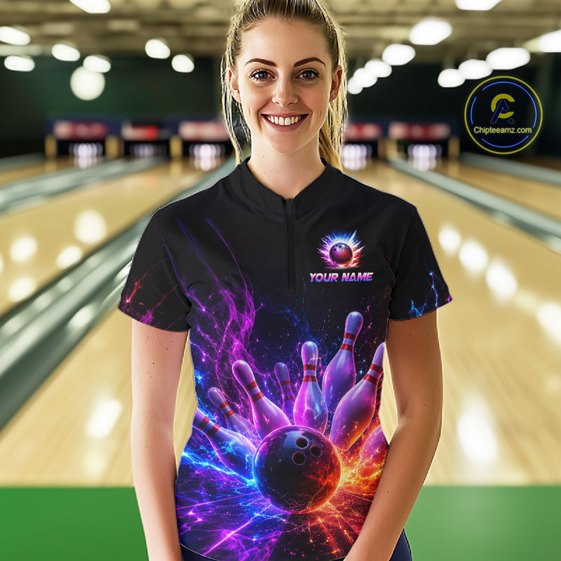 Female bowler wearing Colorful Flames Bowling Ball and Pins bowling jersey during tournament bowling event