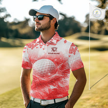 Load image into Gallery viewer, Male golfer wearing blue water splash golf polo shirt, golf ball golf apparel, men's golf outfit