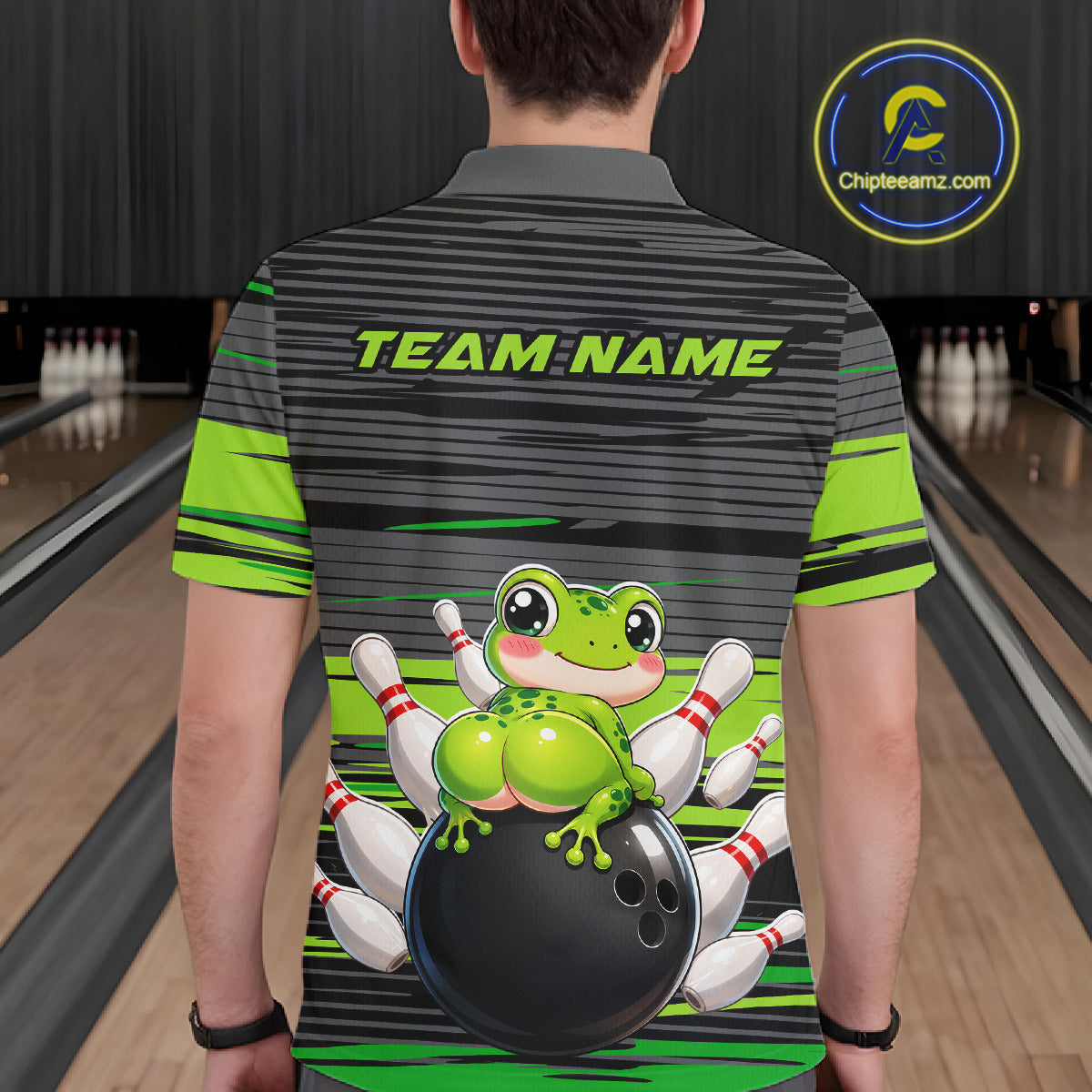 Male bowler wearing Funny Frog bowling jersey with grey and green strike design, custom bowling league shirt