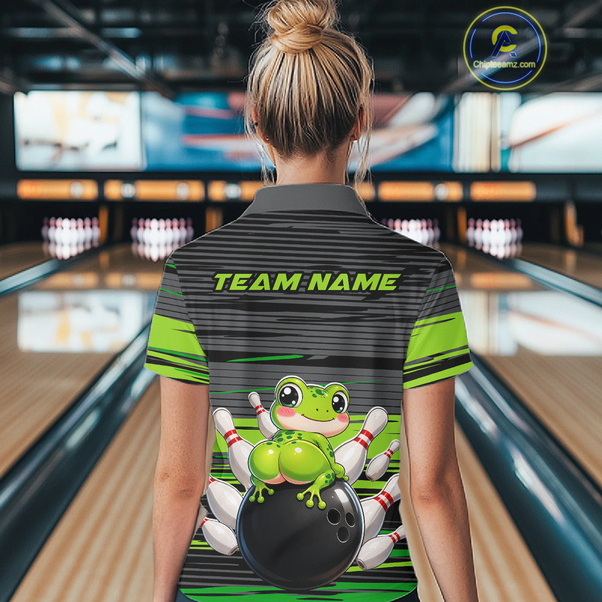 Female bowler wearing Funny Frog bowling jersey with grey and green strike design, custom bowling league shirt