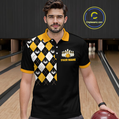 Man wearing a black bowling-themed shirt with a pattern and text in a bowling alley.