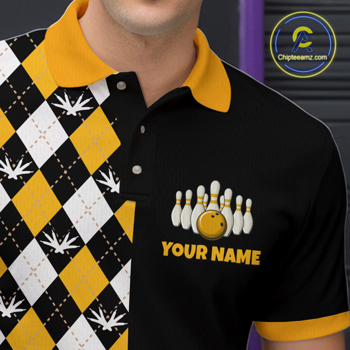 Black polo shirt with yellow and white patterned collar, bowling design, and 'Your Name' text.
