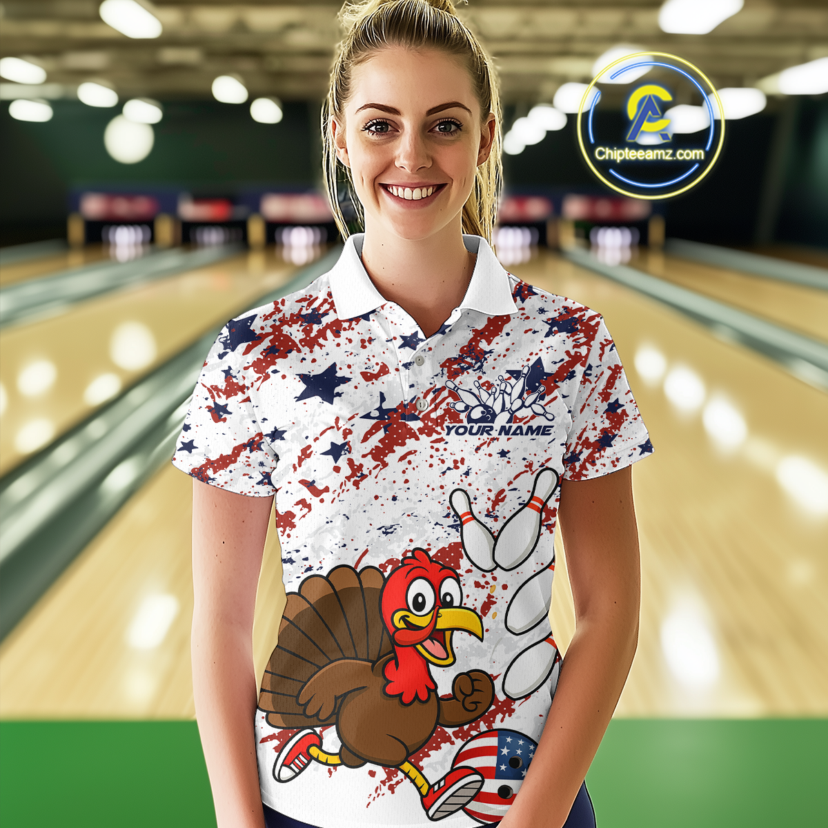 Woman wearing a colorful bowling-themed shirt with a turkey design in a bowling alley.