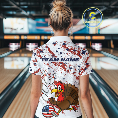 Person wearing a bowling shirt with a turkey design and 'Team Name' text in a bowling alley.